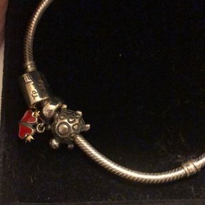 Pandora bracelet with 3 charms